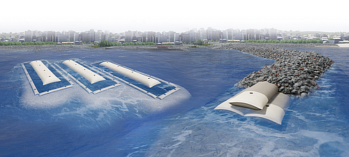 Bolardos y rompeolas realizados con tubos SoilTain para una protección costera eficaz SoilTain Tubes con estera de protección contra la socavación como estructura central y SoilTain Tubes para la protección costera, cubiertos por piedras de blindaje.